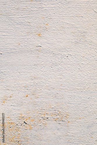 Painted old grunge textured metal sheet surface with traces of rust. Top view, vertical orientation. Flat lay