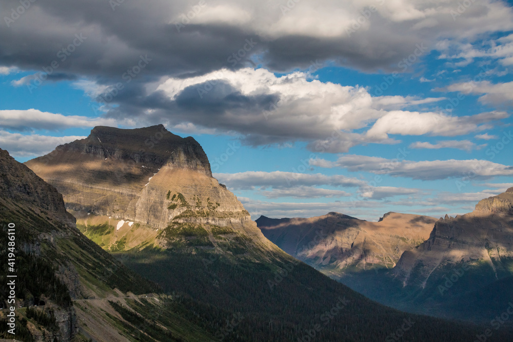 dramatic summer mountain ranges and mountain peaks in the vast Glacier National Park in Montana.