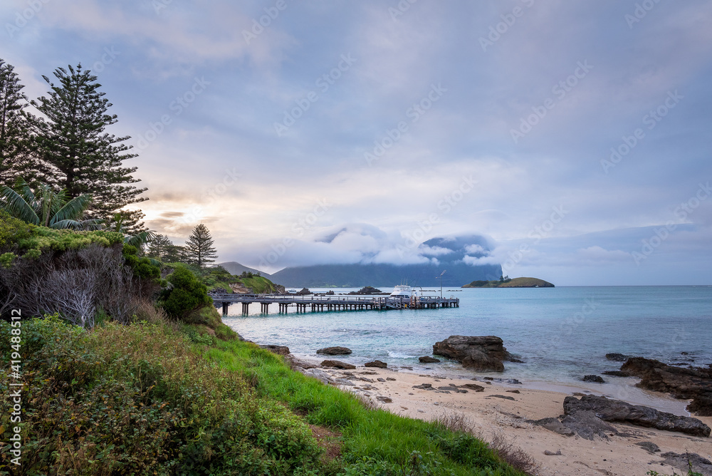 Lord Howe Island jetty in the morning, lifeline for the the delivery of goods to the island Lord Howe Island jetty in the morning, lifeline for the the delivery of goods to the island