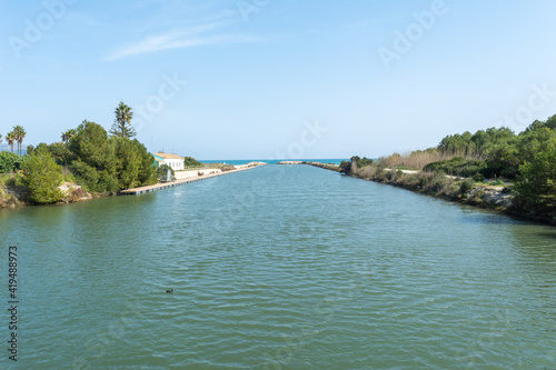 panoramic view, of the bridge of the English, in mallorca, canal grande, fresh water outlet to the mediterranean sea, in bay of alcudia