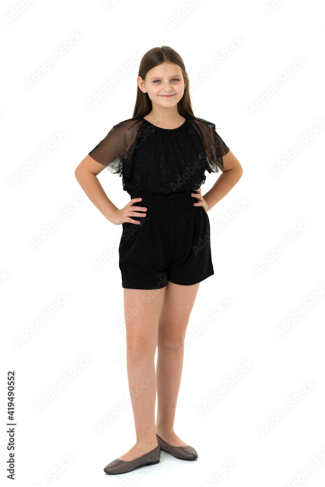 Full length shot adorable girl smiling at camera Full length shot adorable girl smiling at camera
