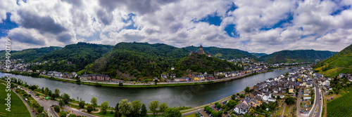 Panorama of Cochem with the Reichsburg Cochem, Germany. Drone photography. .Created from several images to create a panorama image . © Bernhard
