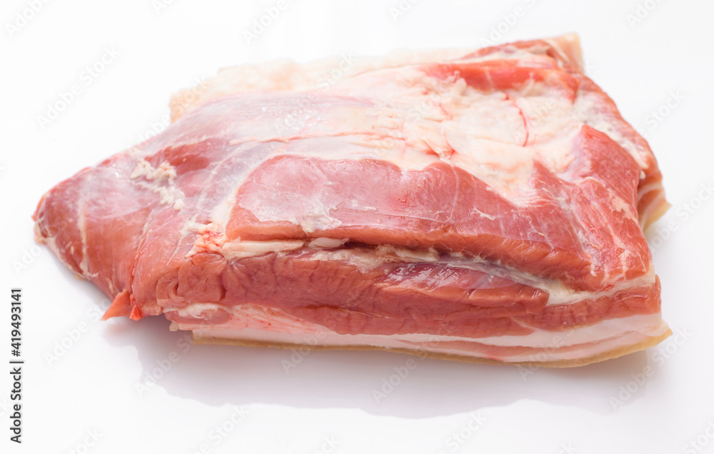 raw meat piece on white background, pork meat and lard