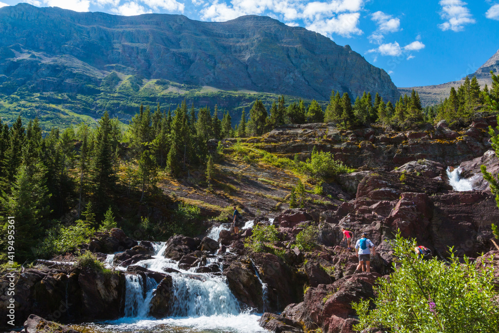dramatic summer mountain ranges , mountain peaks and bodies of water in the Glacier national park in Montana. dramatic summer mountain ranges , mountain peaks and bodies of water in the Glacier national park in Montana.