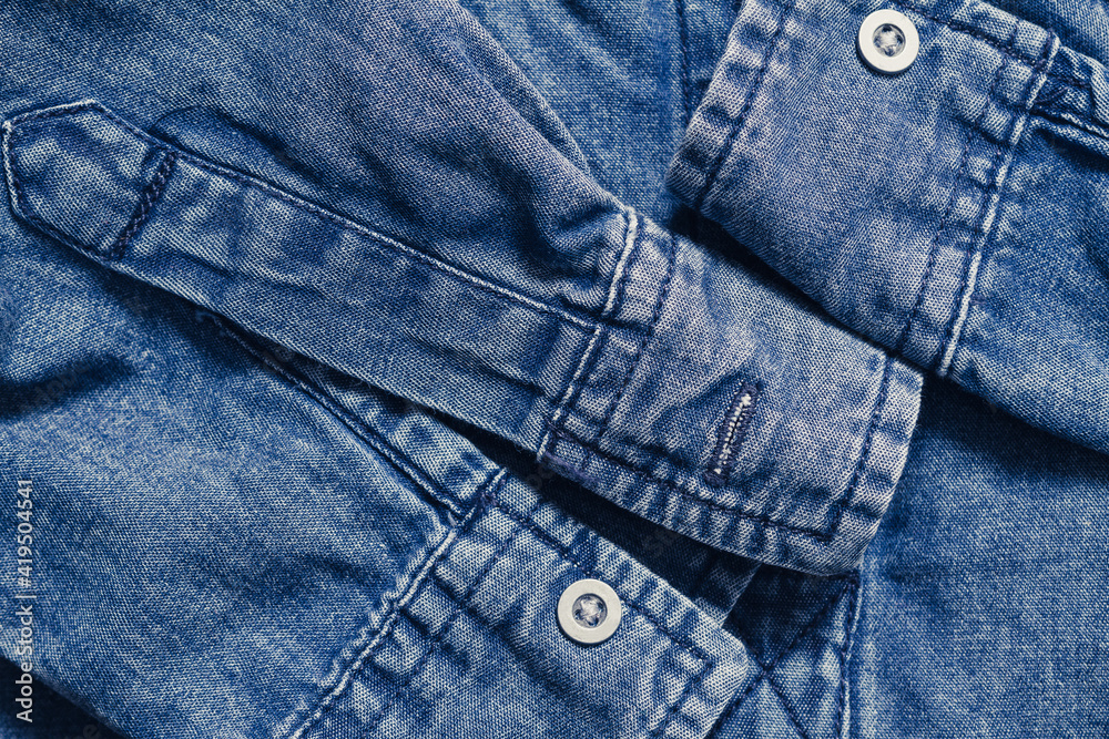 Blue denim clothing top view background Blue denim clothing top view background