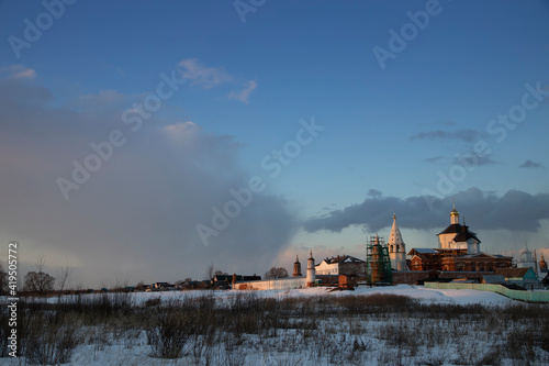 View of the monastery in winter. Winter evening in view of architecture.
