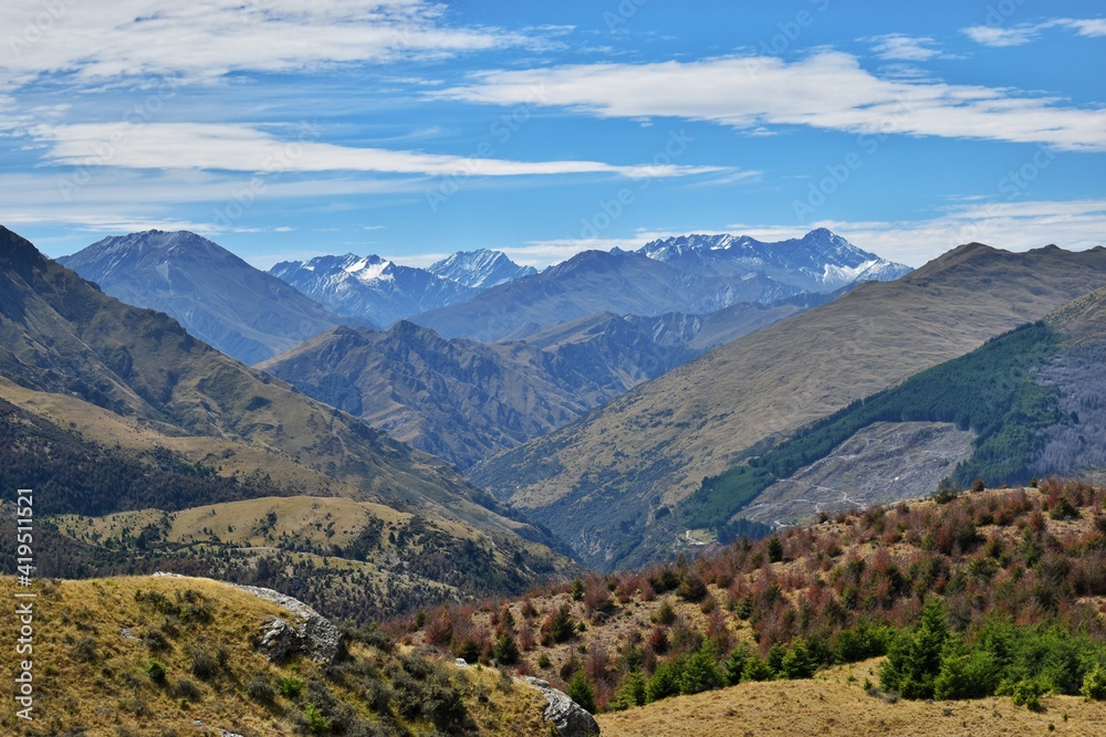 New Zealand, The Queenstown Hill Walk is an easy climb through pine forest to the summit of Te Tapu-nui. At the top you will be rewarded with spectacular views of mountains.