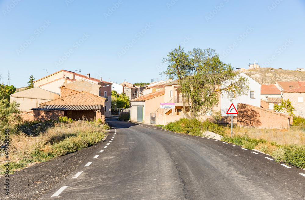 a paved road going through Aldea de San Esteban, municipality of San Esteban de Gormaz, province of Soria, Castile and Leon, Spain