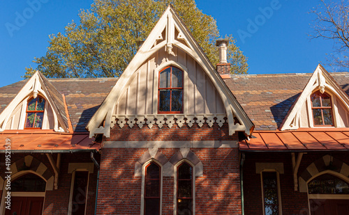 Built in 1873, historic Rockville Railway station is among the few survivors of picturesque  train stations in the area. The brick building has eyebrow dormer windows. photo