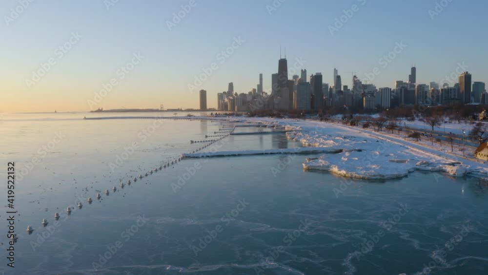 Spectacular View of North Avenue Beach Frozen in Winter. Chicago, Illinois. Push In.