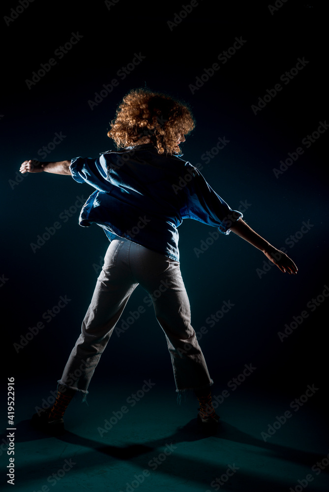 Stylish dance artist while dancing