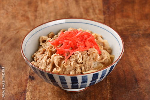 Gyudon - a bowl of rice with sliced beef, onion and sweet sauce. 