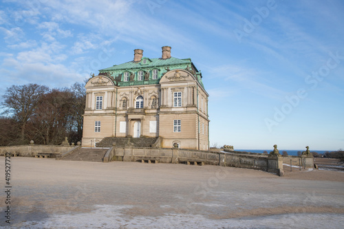 Hermitage Hunting Lodge during a lovely winter day with clear sky.