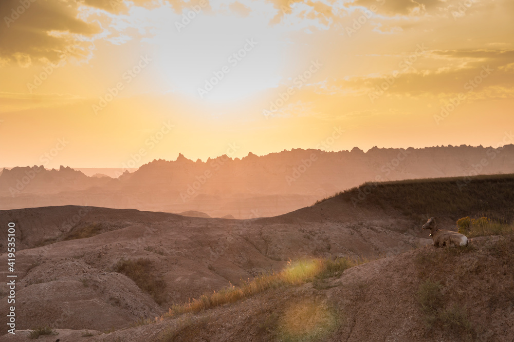 dramatic summer sunset in the Badlands national park in South Dakota.