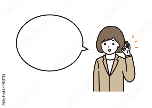 笑顔でOKサインをするスーツ姿の若い女性 吹き出し