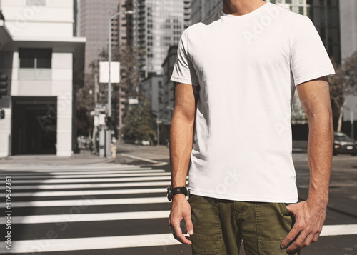 Casual dressed man crossing the road outdoor photoshoot