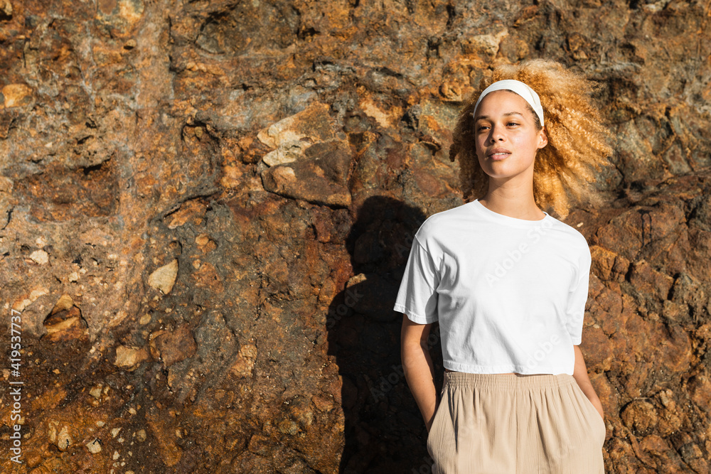 Happy woman in white crop top outdoor photoshoot Happy woman in white crop top outdoor photoshoot