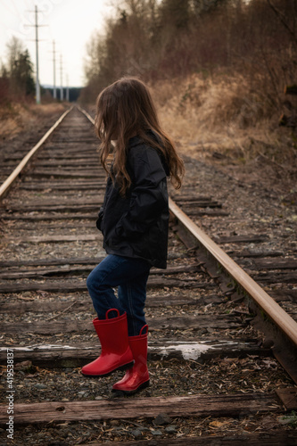 little girl on railway
