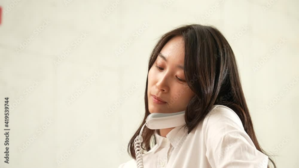 An Asian Businesswoman in the ofice An Asian Businesswoman in the ofice