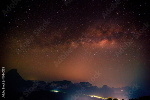 Abstract background of celestial stars, blurred wallpaper of the Milky Way at night, is a natural beauty. Seen during the time of the season © bangprik