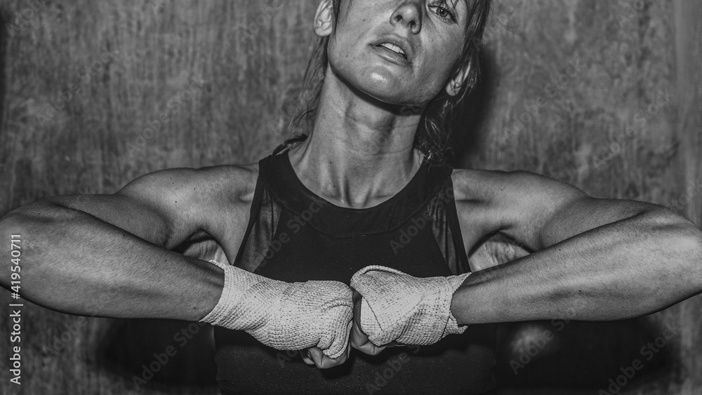 Muscular woman in black and white wallpaper Stock Photo | Adobe Stock