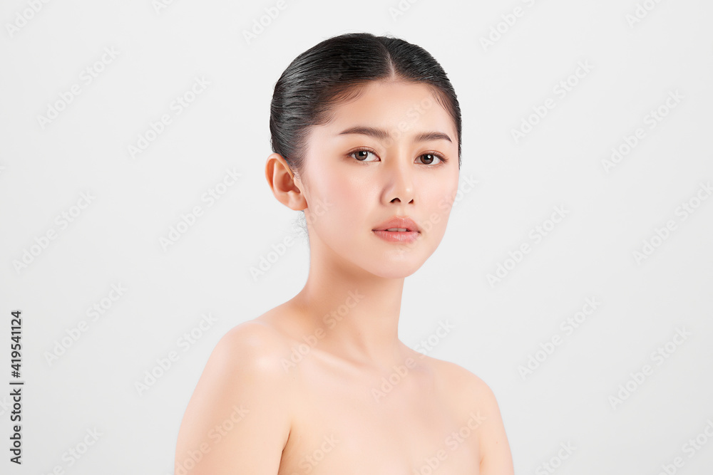Beautiful young asian woman with clean fresh skin on white background, Face care, Facial treatment, Cosmetology, beauty and spa, Asian women portrait Beautiful young asian woman with clean fresh skin on white background, Face care, Facial treatment, Cosmetology, beauty and spa, Asian women portrait