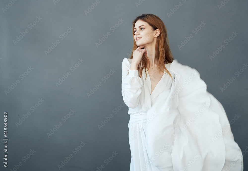 Woman in white dress luxury gray background cosmetics model Woman in white dress luxury gray background cosmetics model