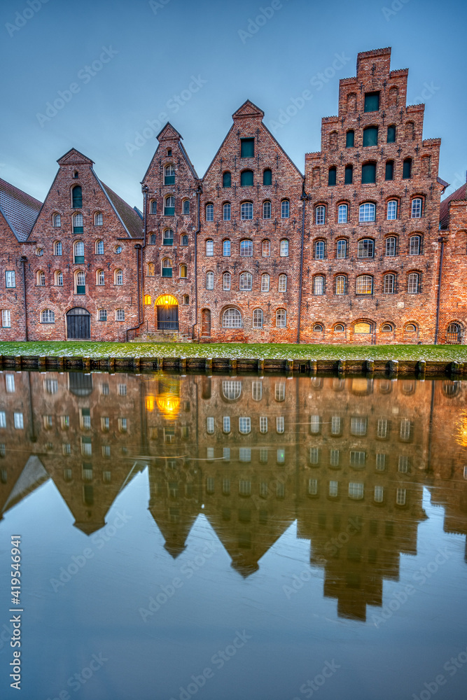 The medieval Salzspeicher with the Trave river at dawn, seen in Luebeck, Germany