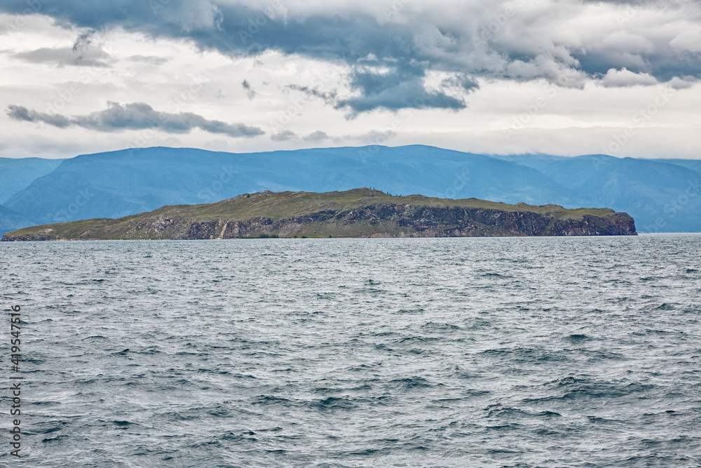 Lake Baikal in cloudy weather. Cold summer Lake Baikal in cloudy weather. Cold summer