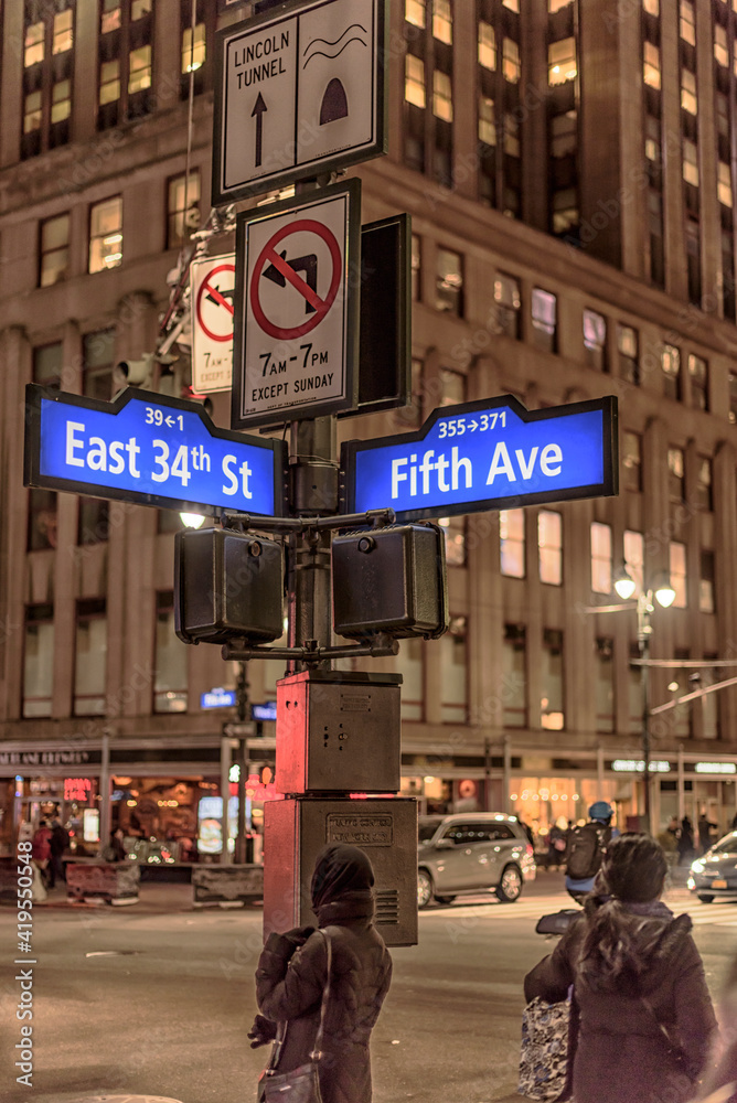City street sign at night at Manhattan NYC USA