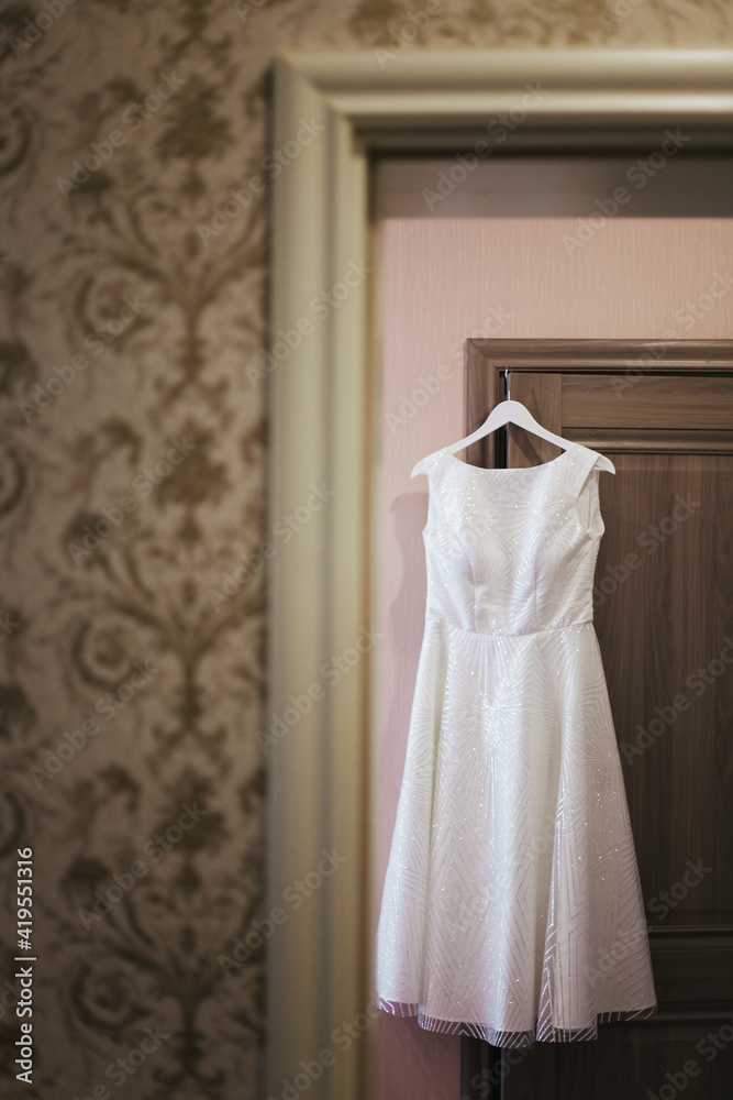 Wedding dress. Wedding fashion. Wedding dress on a hanger. Bride. Wedding dress. Wedding fashion. Wedding dress on a hanger. Bride.