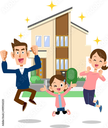 一戸建ての前で喜ぶ三人家族
