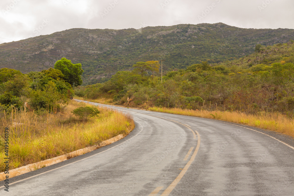 Wet tarred road street after rain close to Grao Mogol in Minas Gerais, Brazil