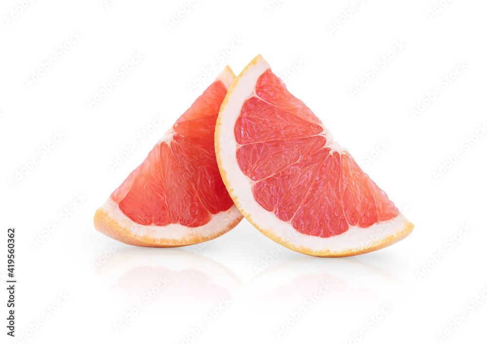 Two slices of grapefruit isolated on a white background Two slices of grapefruit isolated on a white background