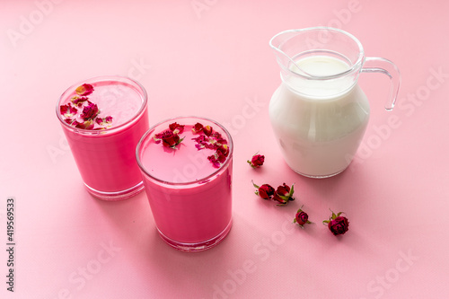 Pink rose and beetroot latte coffee or tea with milk, top view