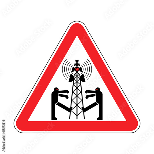 Attention 5G tower chipping population. Warning red road sign. Caution Zombies walk around cell tower. Conspiracy theory. TV and radio communication towers