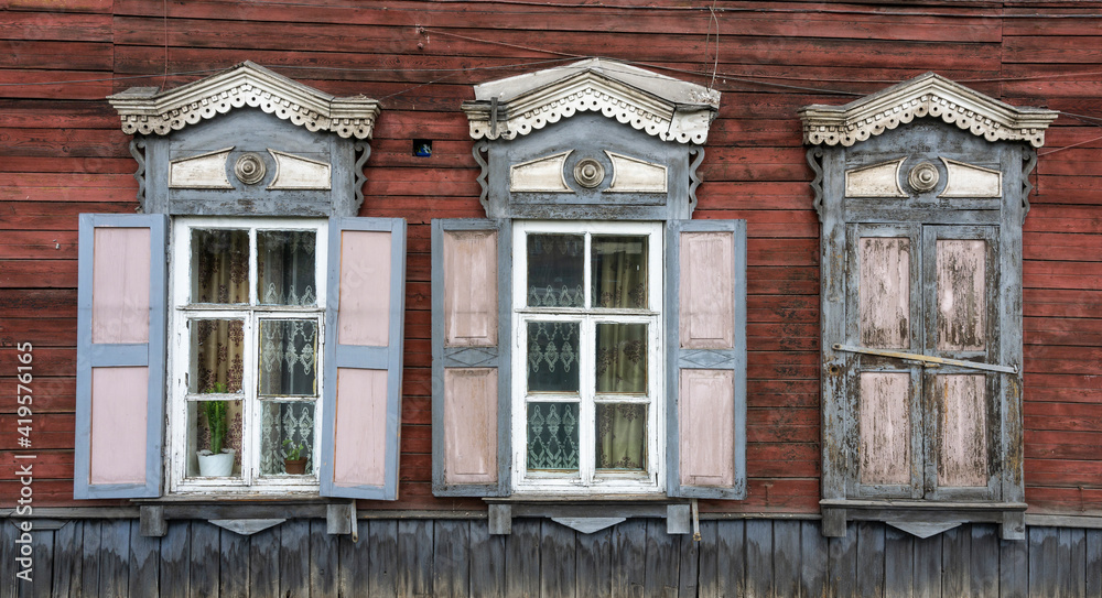 Fototapeta premium Russian Red Log Cabin Pink Shutters