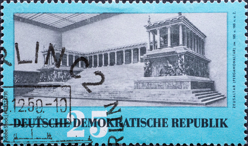 GERMANY, DDR - CIRCA 1959 : a postage stamp from Germany, GDR showing the Zeus Altar Pergamon (185 to 160 BC) in the Museum of Berlin. antique art treasure