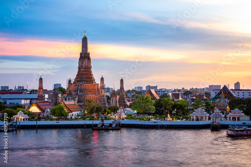 Atmosphere Of  Wat Arun in twilight, It is spectacular, This is an important buddhist temple  and a famous tourist destination at bangkok in thailand. © Thasist
