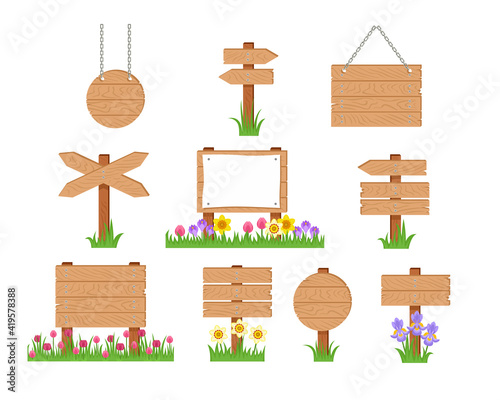 Vector wooden sign board and pointer in green grass and bright spring flowers set.  Cartoon old wood sign post, banners hanging on chains and arrow isolated on white. Simple flat illustration.