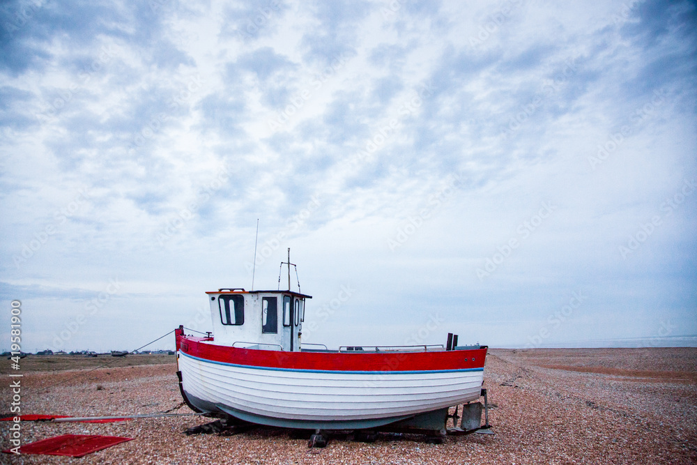 deserted coast of Dungeness with old fishing boats