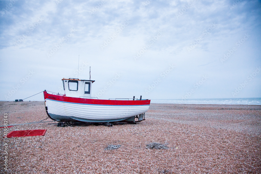deserted coast of Dungeness with old fishing boats