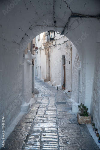 narrow alley of Ostunis oldtown, Puglia
