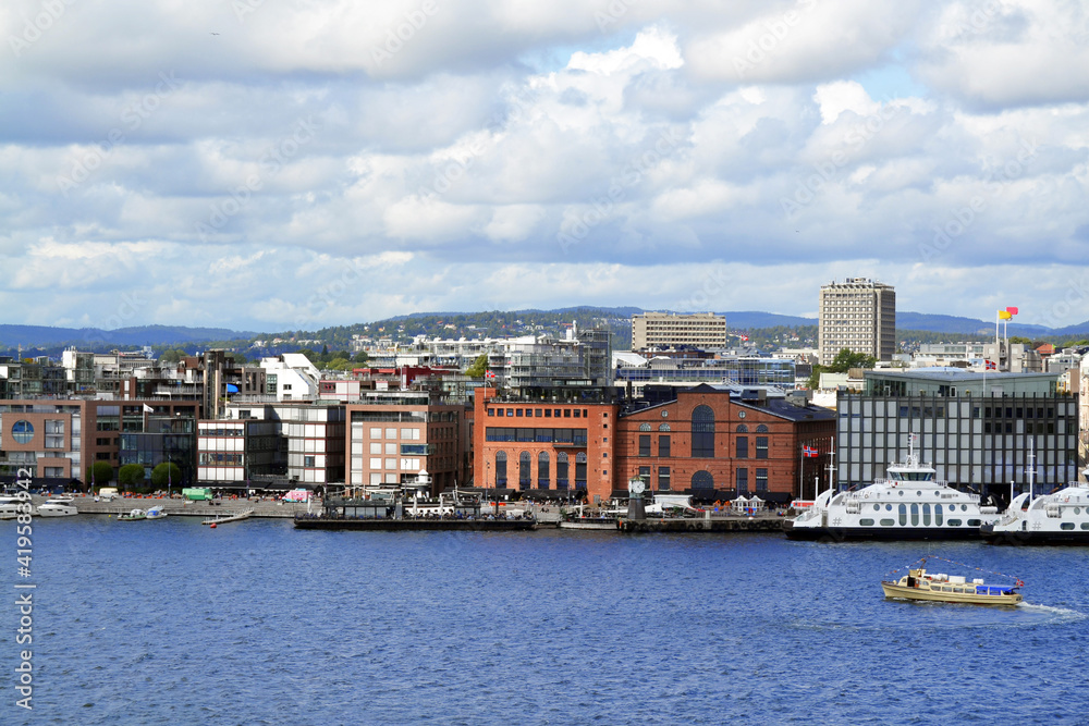 Panoramic top view of the promenade with modern buildings. Beautiful seascape in a summer day, Oslofjord, Oslo, Norway.
