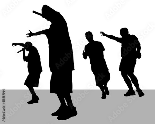 Young man with a microphone reads a rap. Stylized image on theme of hip hop