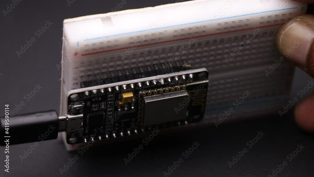 IOT Projects prototyping board connecting to power supply followed by