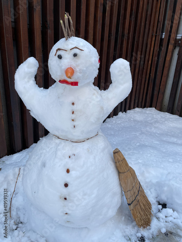 snowman on the snow photo