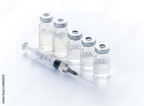 syringe and medicine bottle