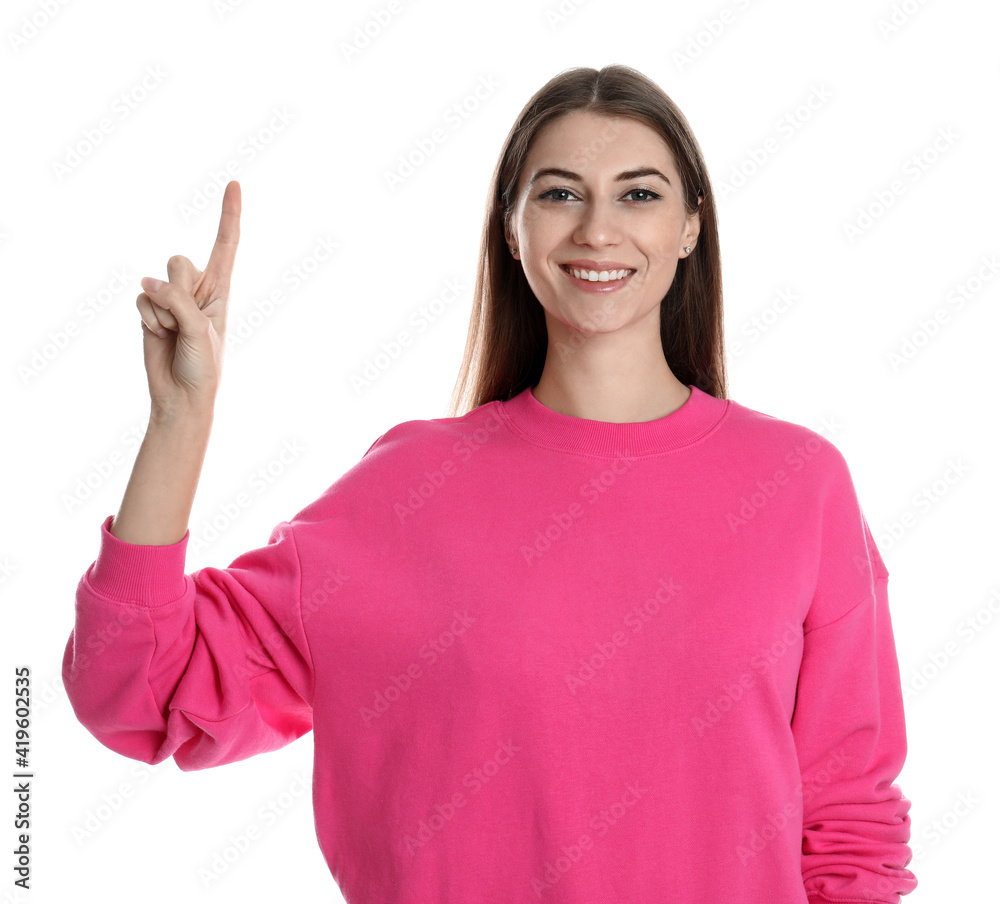 Woman showing number one with her hand on white background Woman showing number one with her hand on white background