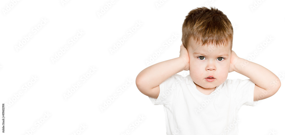 little 3-years child closing ears with hands frightened emotion isolated on white with copy space little 3-years child closing ears with hands frightened emotion isolated on white with copy space